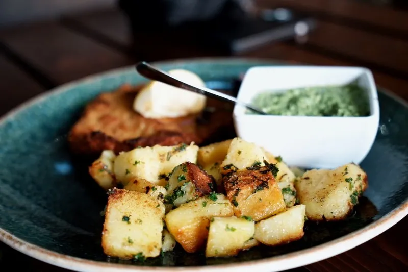 Roasted Potatoes & Zucchini Bake Recipe In A Creamy Parsley Sauce