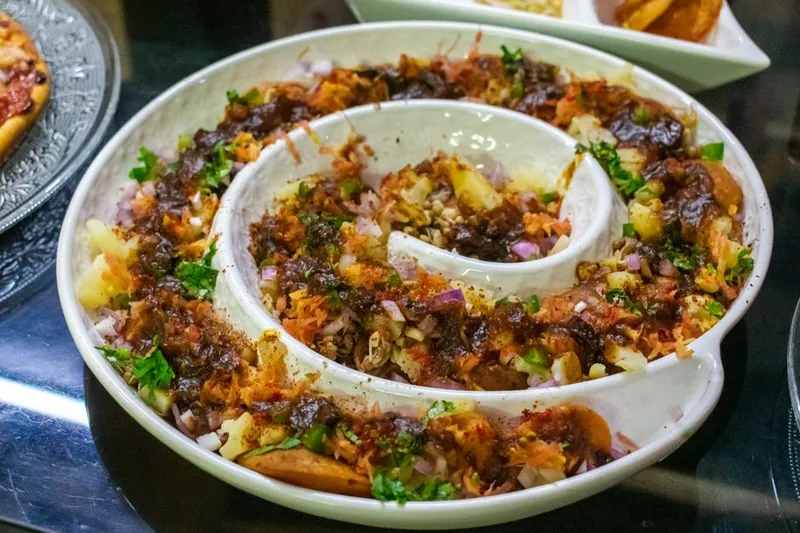 Pavakka Theeyal Recipe - Spicy & Tangy Karela In Tamarind Gravy