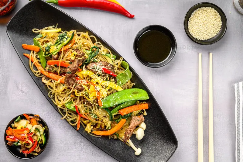 Noodle Sizzler With Garlic Pepper Sauce And Baked Vegetables Recipe — photo 2