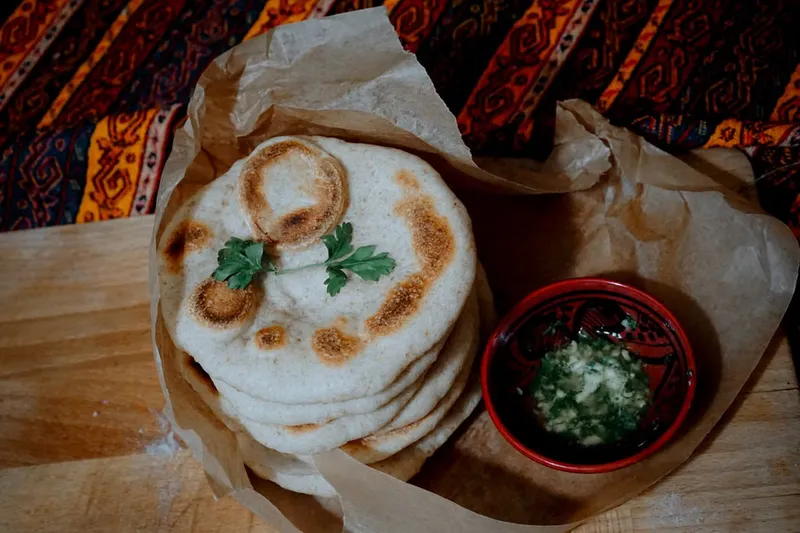 Butter Garlic Naan Recipe - Garlic Flavoured Flatbread — photo 2
