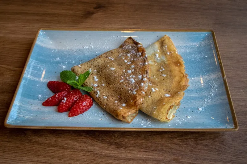 Whole Wheat And Ragi Crepe With Muesli And Strawberry Recipe — photo 2