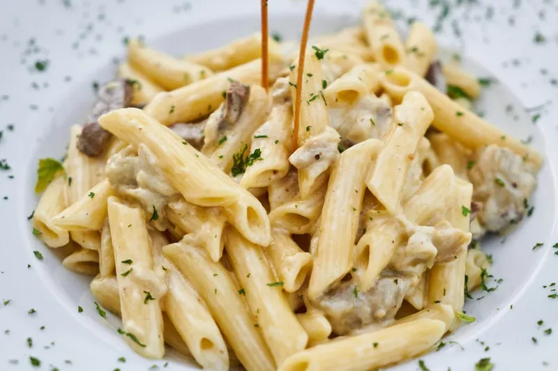 Baked Farfalle Pasta With Mushrooms Peas And Lemon White Sauce Recipe