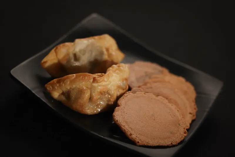 Karwar Style Yerappe Ani Recipe- Rice and Black Split Gram Fried Dumpling