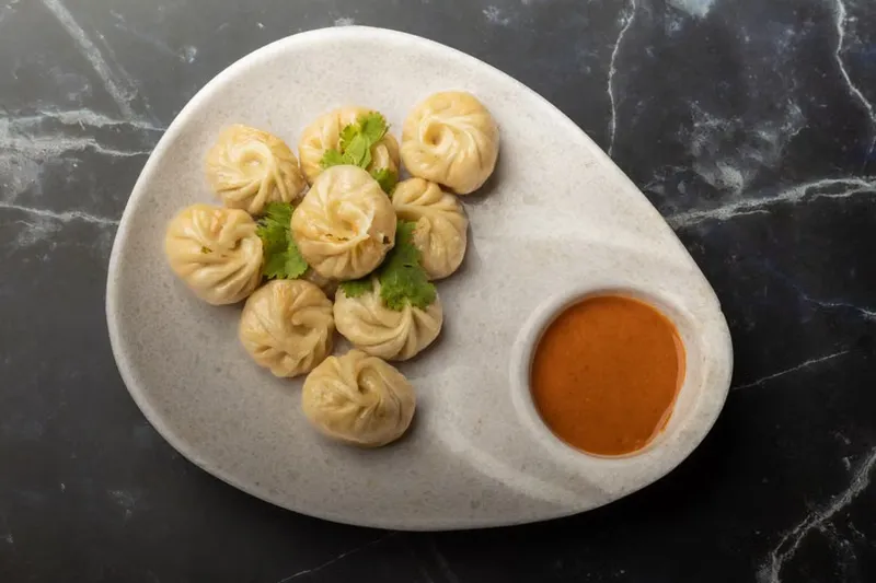Chicken Schezwan Momo - Steamed Chicken Dumpling Recipe