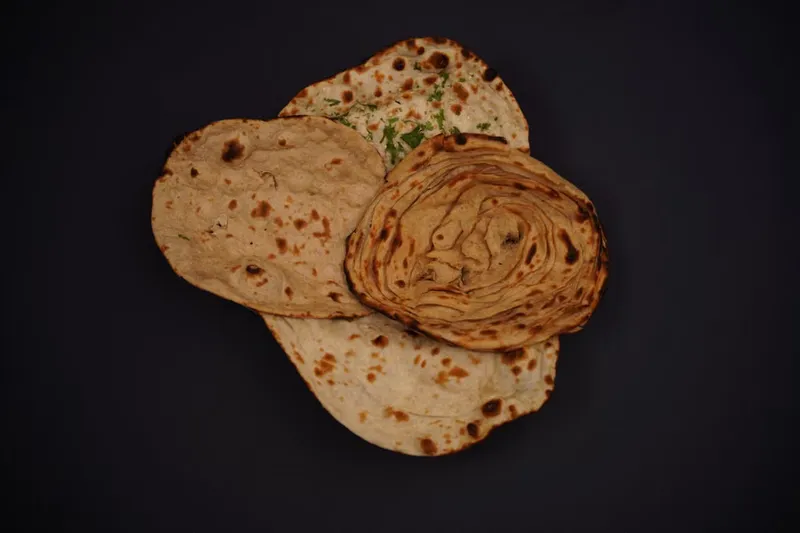 Achari Lachha Paratha Recipe-Spicy Indian Style Flaky Bread