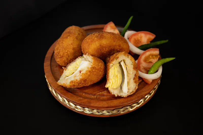 Bengali Style Dimer Chop Recipe