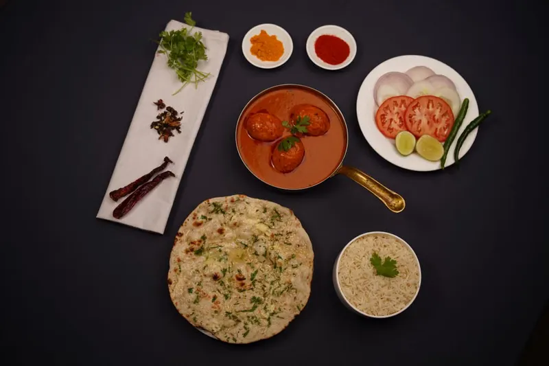 Kashmiri Style Tamatar Chaman Recipe -Paneer Cooked With Tomatoes