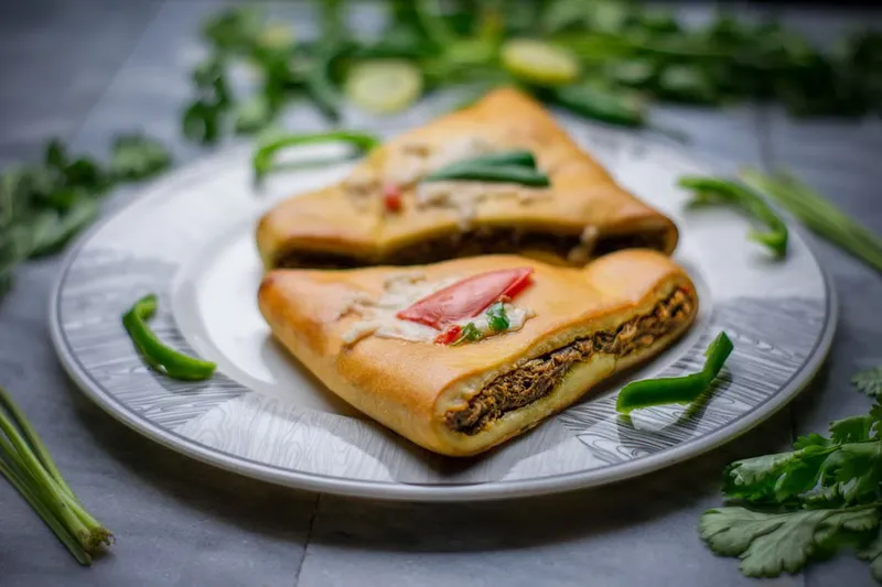 Malabar Style Erachi Pathiri Recipe - Flat Bread Stuffed With Shredded Chicken