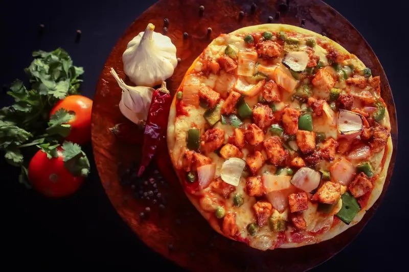 Tortilla Pizza With Tomato, Onion And Capsicum Recipe — photo 2