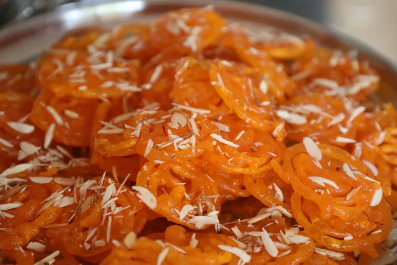 Malpua With Rose And Saffron Syrup Recipe