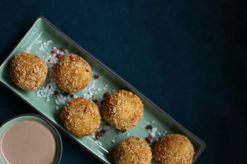 Italian Arancini Rice Balls Recipe With Delicious Pasta Dipping Sauce
